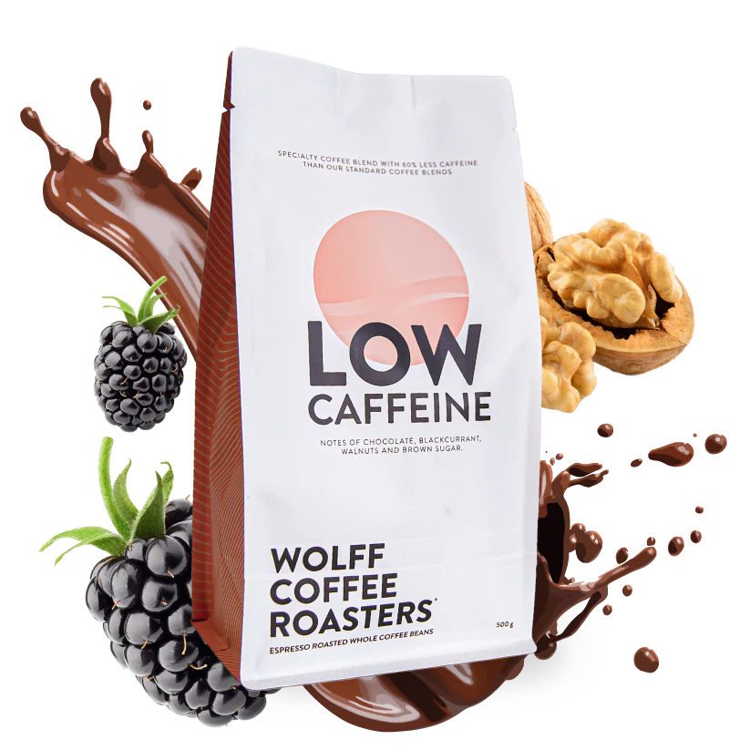 Roasted coffee beans. Wolff Coffee Roasters Low Caffeine Blend, 500g bag with chocolate, fruit and nuts in the background. The Roast Collective