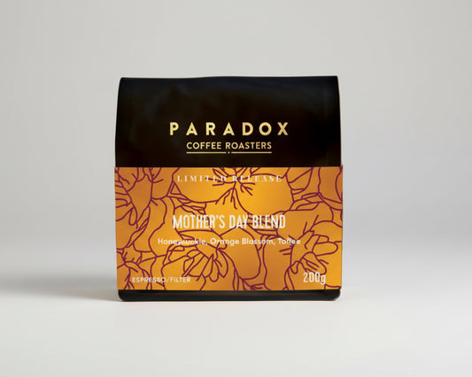 Coffee from The Roast Collective. Paradox Coffee Roasters Mother's Day Blend packaging on a white background