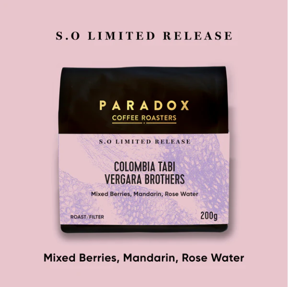 Paradox Coffee Roasters Colombia Tabi Vergara Brothers coffee package on a pink background